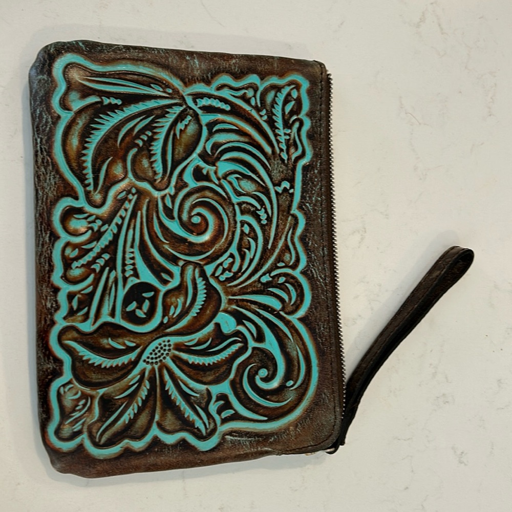Patricia Nash Brown and turquoises wristlet.